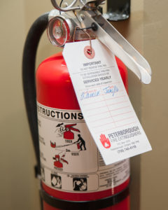 Fire Extinguisher with inspection tag